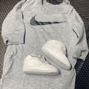 Nike bodysuit and Air Force ones shoes